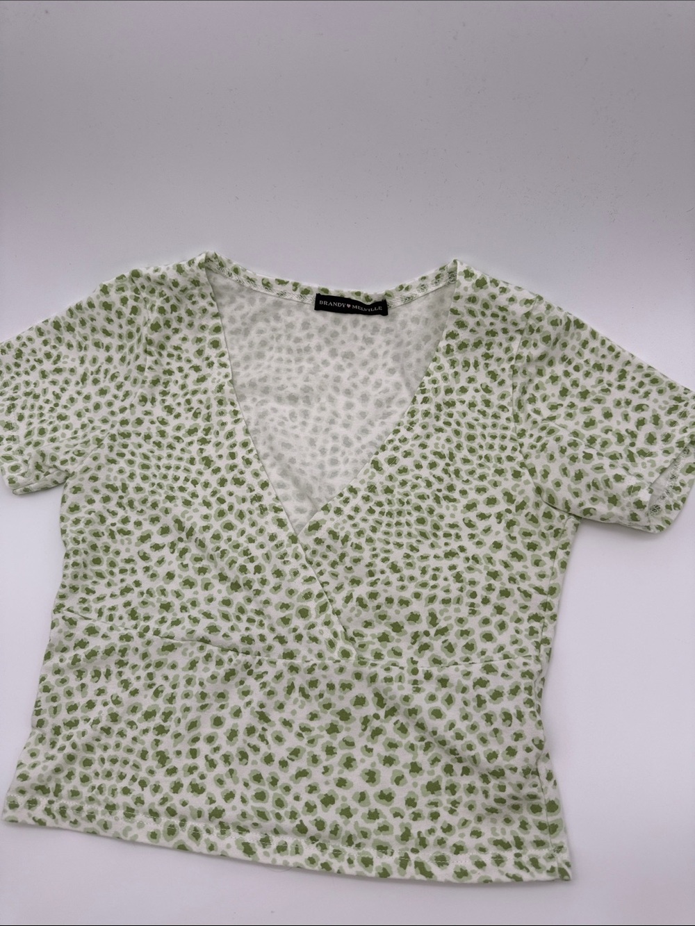 Brandy Melville White Tee with Green Leopard Print